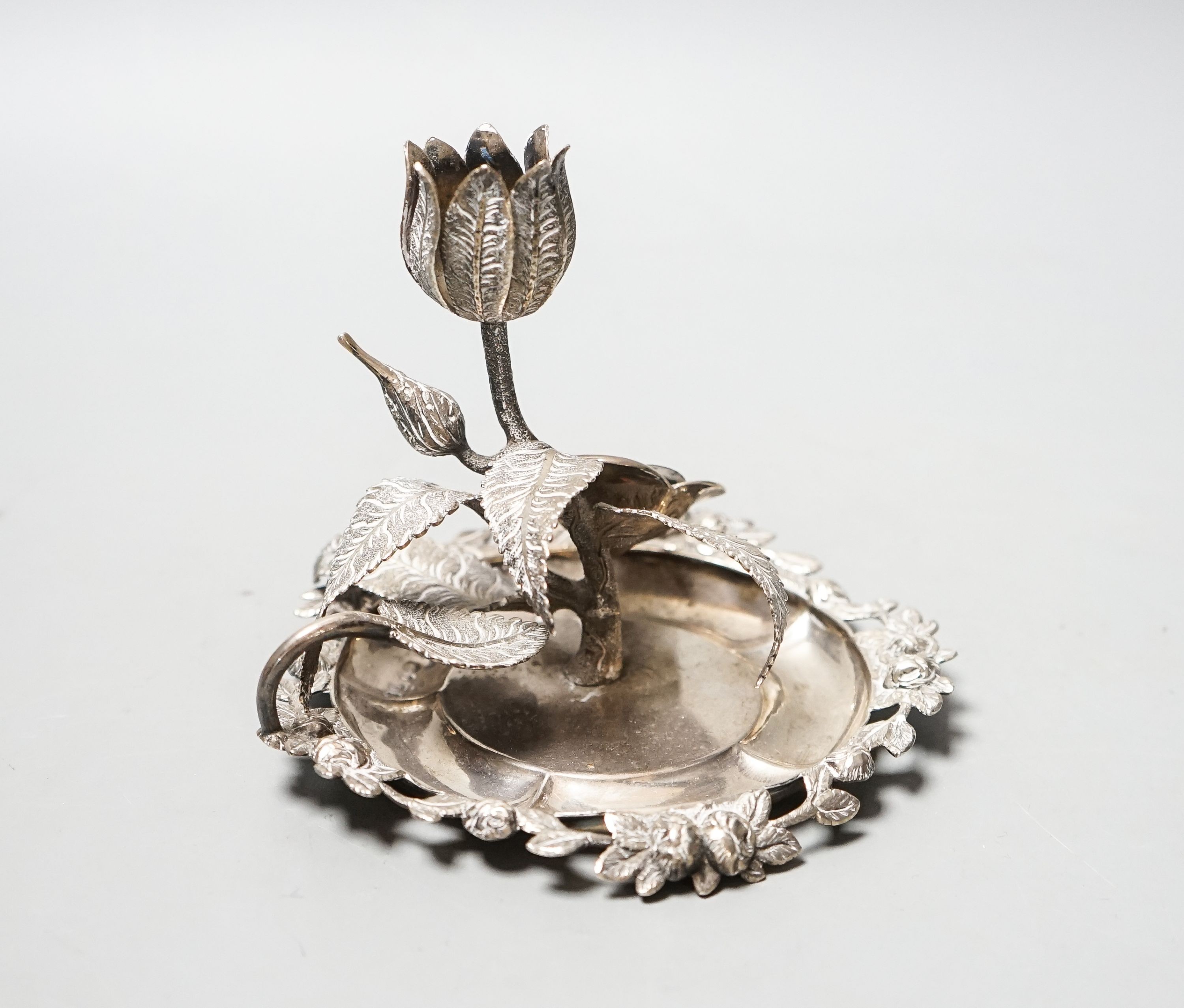 A George IV silver ‘rose’ chamberstick by Sampson Mordan and George Riddle, London, 1829, diameter 11.5cm, 186 grams.